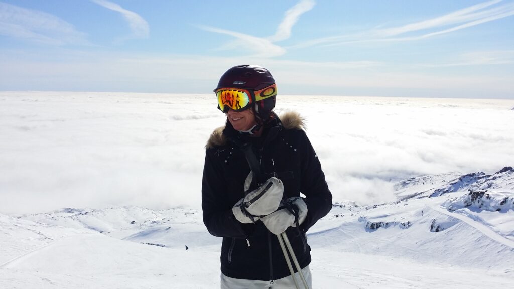 Skier standing above a sea of cloud on Mt Ruapehu